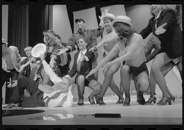 Performers on stage at the Hexagon Theater